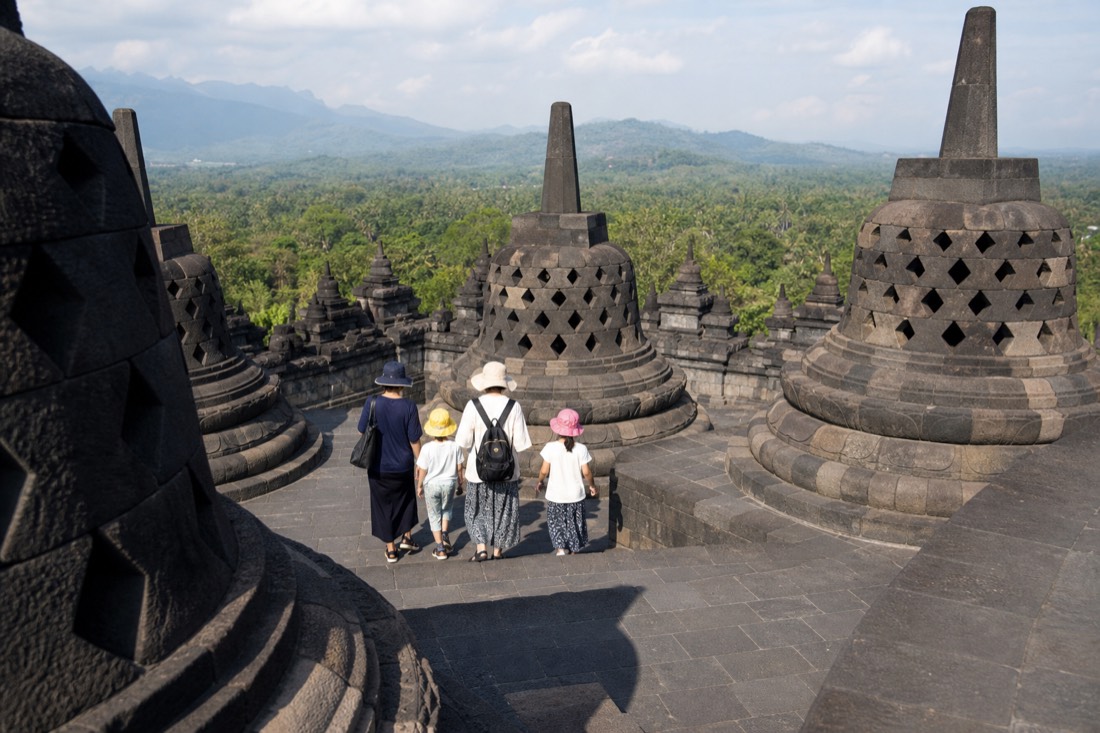 A family among the stupas of Borobudur